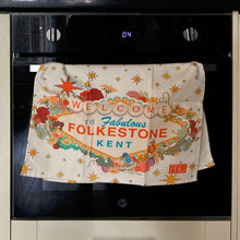 Load image into Gallery viewer, Folkestone Sign Tea Towel – A Playful Coastal Tribute
