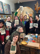 Load image into Gallery viewer, a class of students showcase their artworks from their company workshop